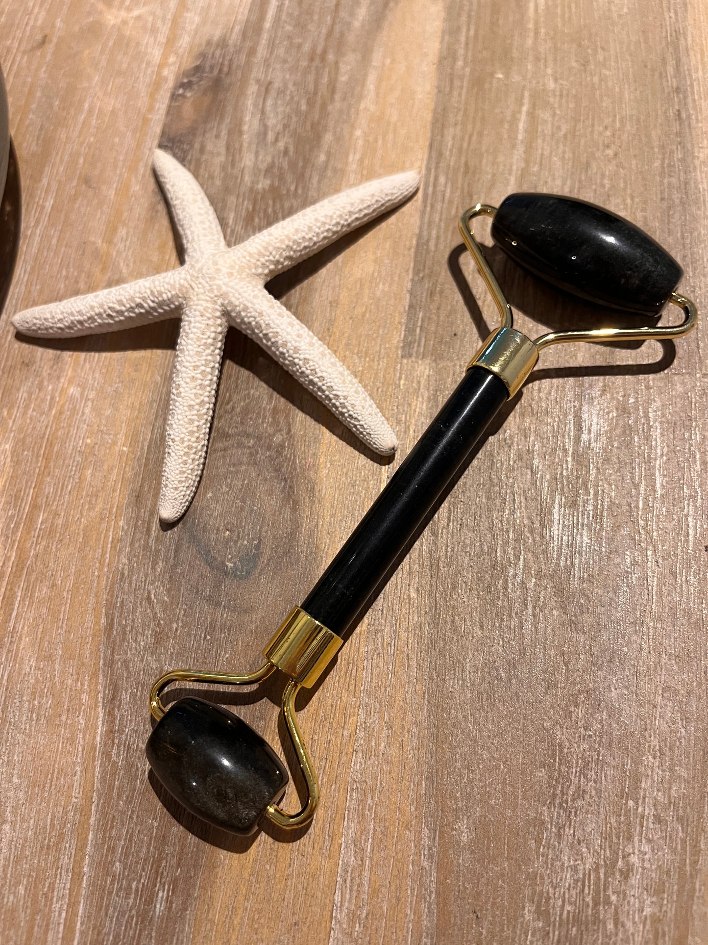 roll on pour le soin du visage en pierre naturelle d'obsidienne